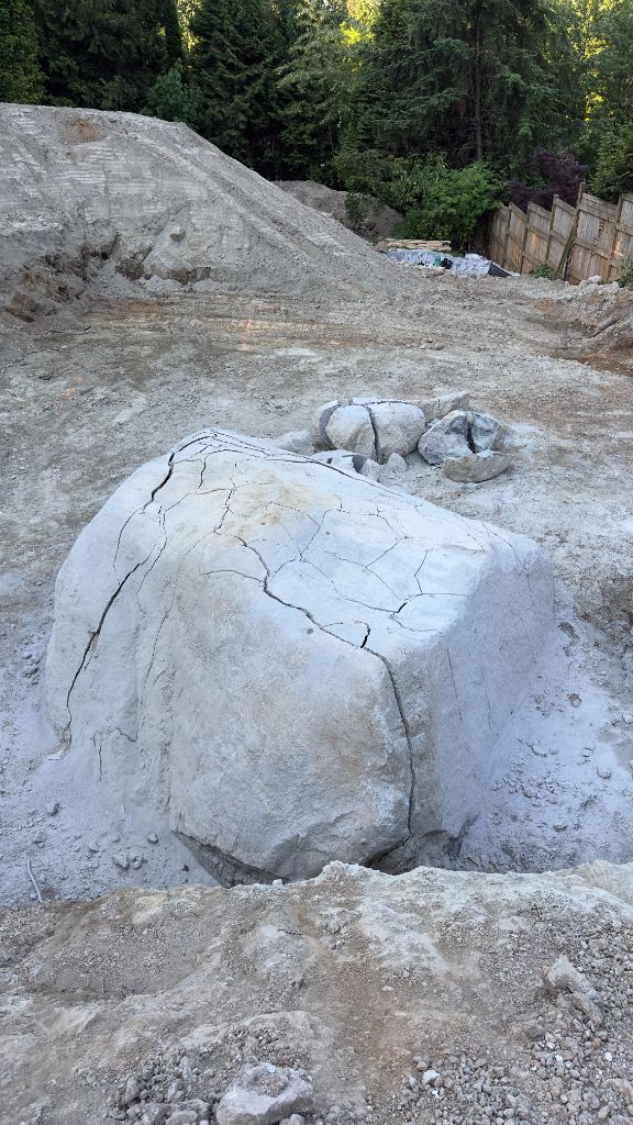 Massive boulder split through controlled alternative blasting